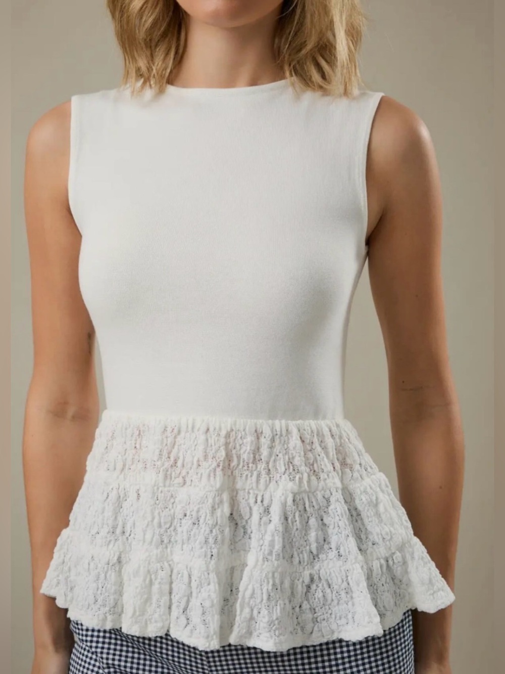 149. Sleeveless White Peplum Lace Hem Top